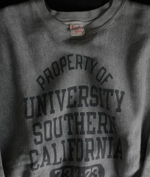 Photographic close-up of a 1970s Champion USC Crewneck Sweatshirt.